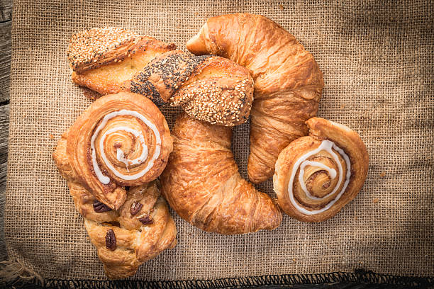 istock fresh bread  and wheat on the wooden 604024554