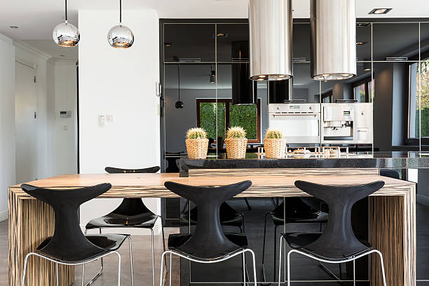 istock Modern kitchen ruled by metal and glass 604026090