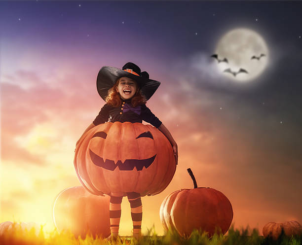 istock little witch outdoors 604026924