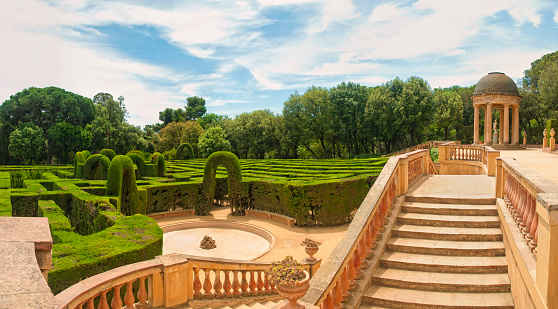 panoramic view of a garden with a maze