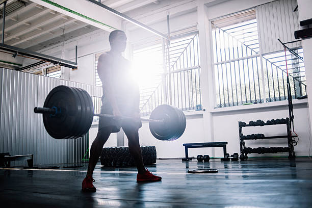 deadlifts - men weight training african descent male photos et images de collection