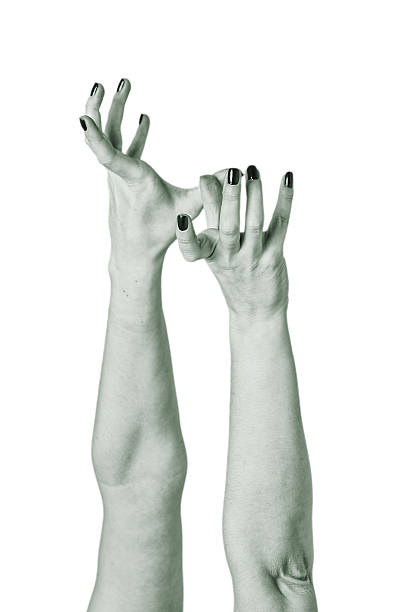 istock Zombie woman hands reach out isolated 604042616
