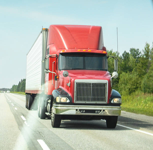 istock American truck on the road 604048884