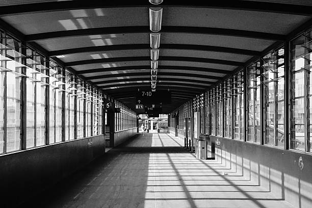 istock Covered Footbridge At Railroad Station 604213701