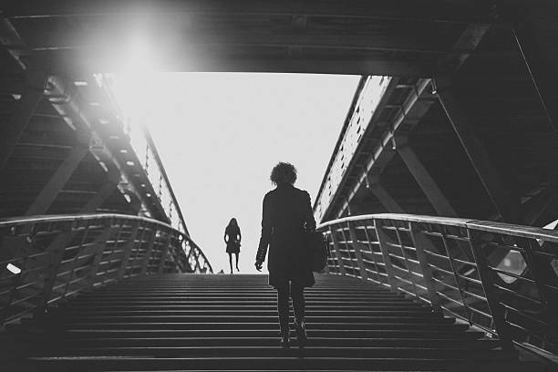 istock Low Angle View Of Woman Climbing Steps 604222227