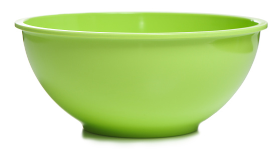 Green mixing bowl on white