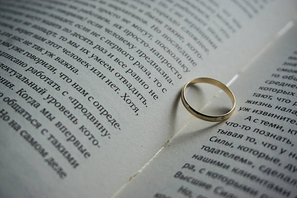 istock I love you, wedding ring on a book spread 604339260