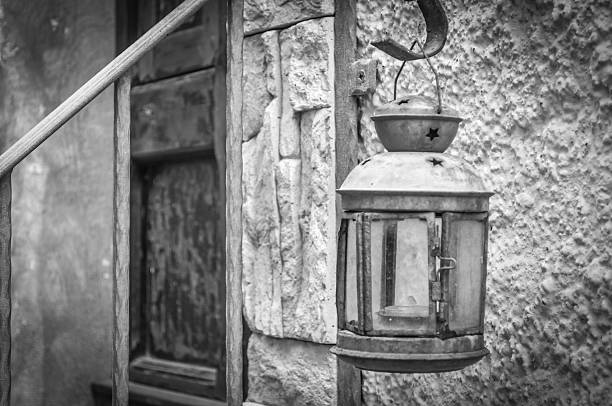 old lantern in alley of castelsardo old city the beautiful alley of castelsardo old city - sardinia - italy castelsardo photos stock pictures, royalty-free photos & images