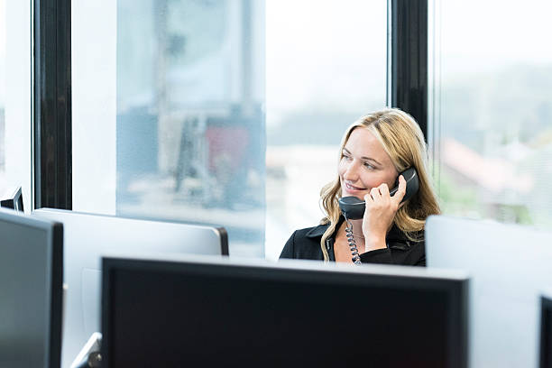 istock Professional business manager on telephone in office 604340772