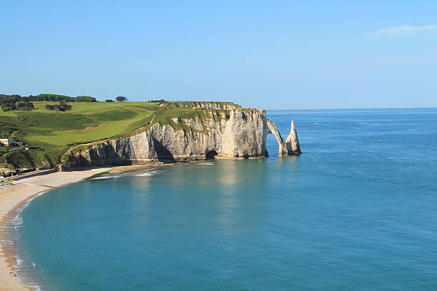 istock Beach and cliffs of etretat, France 604342866