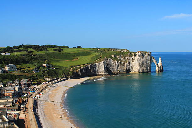 istock Beach and cliffs of etretat, France 604343246