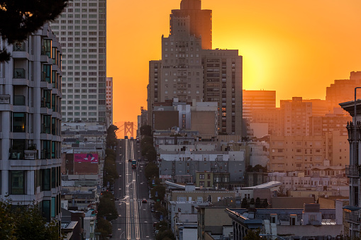 San Francisco, California street, vertical, sunrise, sunbeam, bay bridge.