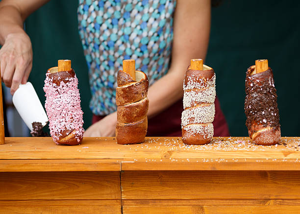 Trdelnik Czech traditional delicacy made from dough wrapped stock photo