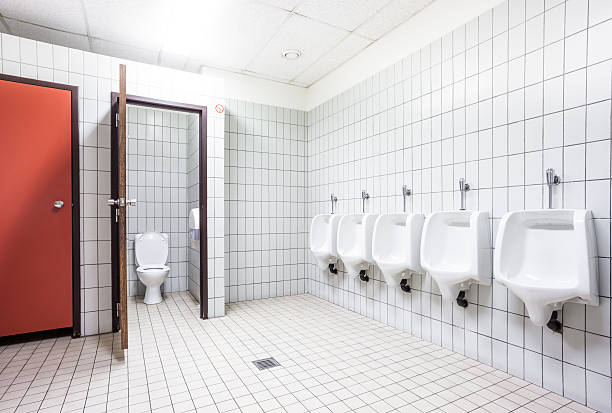 istock urinal and toilet doors 604350574