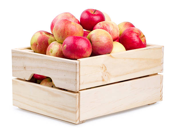 istock Wooden box full of fresh apples isolated 604351796