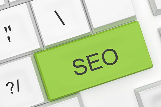 istock Computer Keyboard: SEO On A Green Key, 3d illustration 604353200