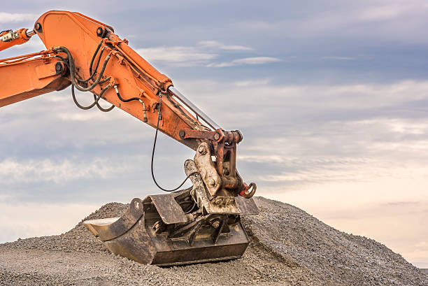 istock Excavator arm and bucket 604354254