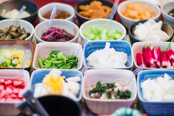 Varieti of Japanese food Prepared Japanese pickled vegetables and sea food in small dishes to take away. Japan pickled turnip stock pictures, royalty-free photos & images