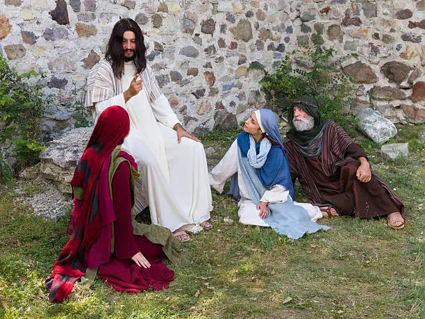 Jesus preaching to a group of people - historical reenactment