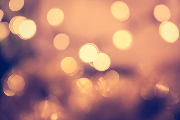 istock Toned bokeh with blinking Christmas lights in vintage style 604355830