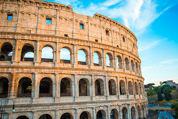 istock Colosseum or Coliseum background blue sky in Rome, Italy 604356092