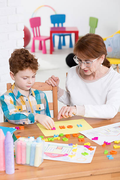 istock Learning through fun in a colorful child therapist office 604356414