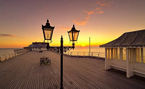 Cromer beach and Pier in Norfolk during a sunrise in the summer 2016