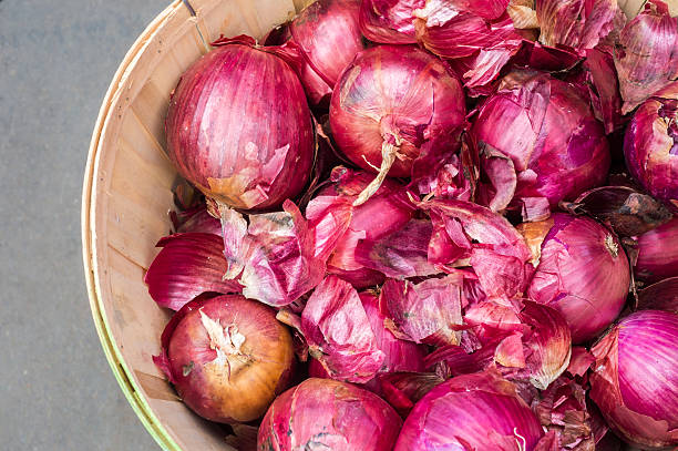 Red onions in a basket at the market