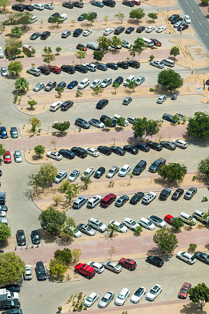 istock Cars on parking place from above 604358906