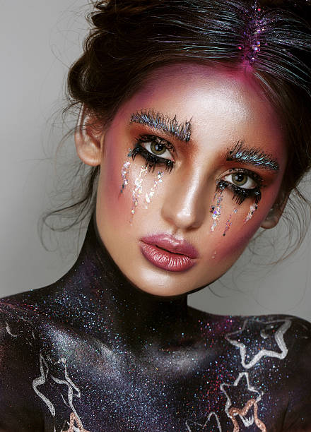 istock Art make up.Woman portrait with creative body- 604359294