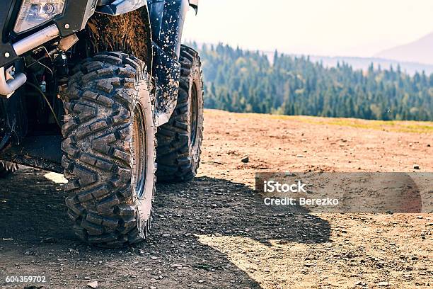 Quadricycle In The Mountains Stock Photo - Download Image Now - Quadbike, Off-Road Vehicle, Riding