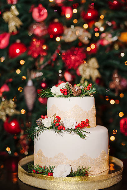 Wedding cake on the background of Christmas tree