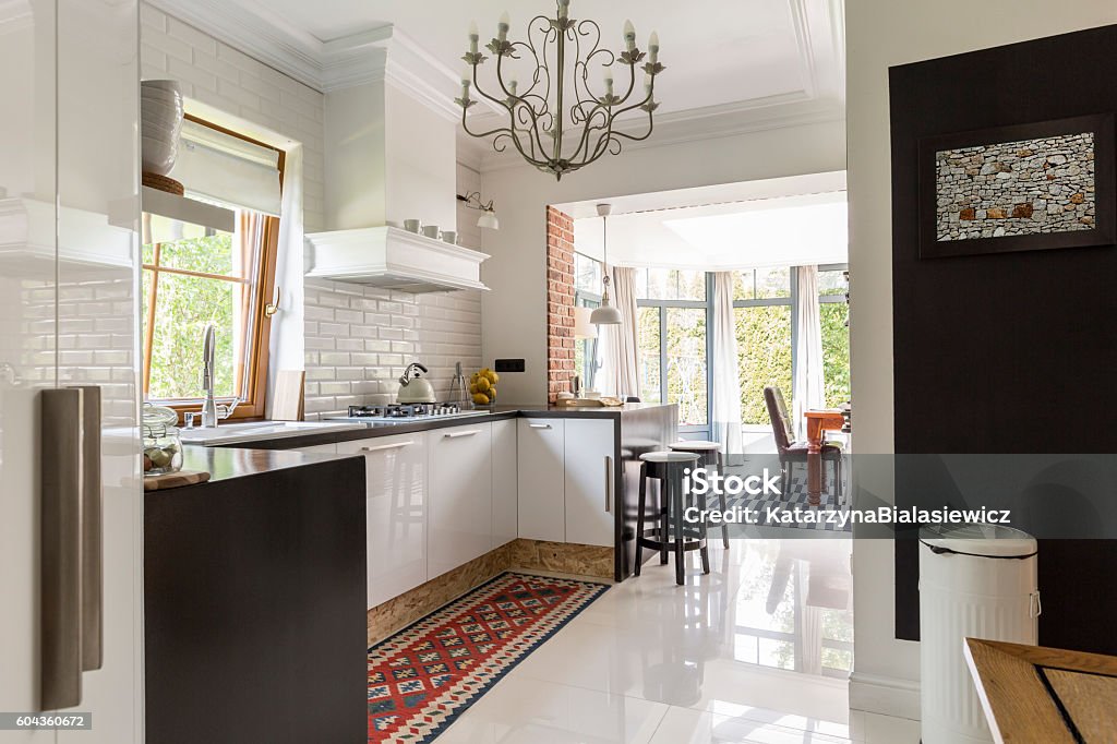 Suburb modern kitchen Creative interior- suburb white and black modern kitchen Kitchen Stock Photo
