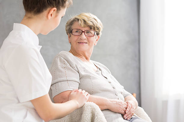 istock Senior woman and caregiver 604362254