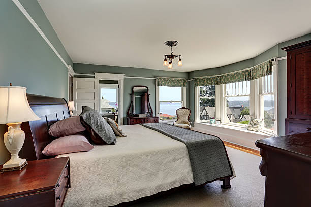 istock Luxury bedroom interior in blue tones and king size bed 604362916