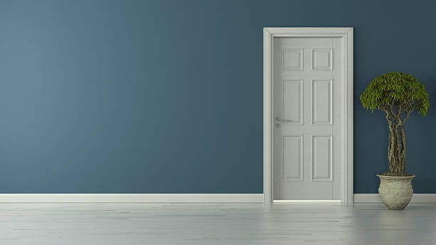 istock closed american door with blue wall 604363792