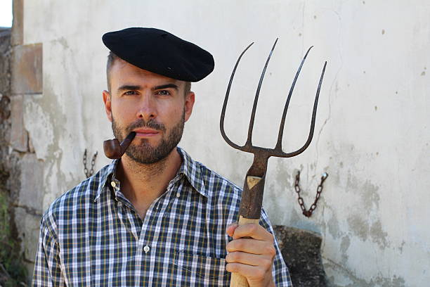 istock Portrait of young bearded handsome farmer 604363986