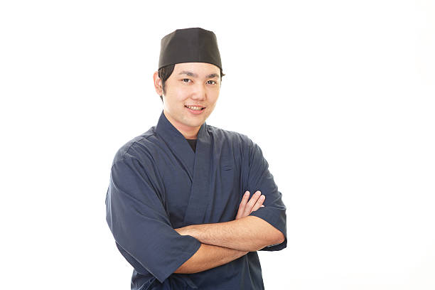 Smiling Japanese chef Portrait of a Japanese chef japanese chef stock pictures, royalty-free photos & images