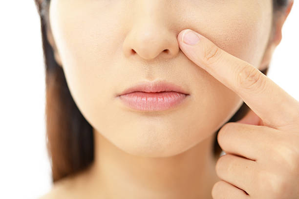 istock Woman with an uneasy look. 604366606