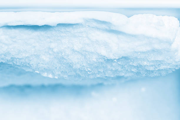 Ice and Frost Buildup Inside a Refrigerator Freezer stock photo