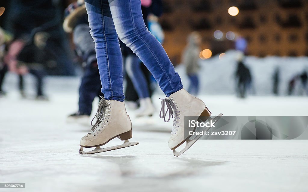 the girl on the figured skates the girl on the figured skates on a skating rink Ice-skating Stock Photo