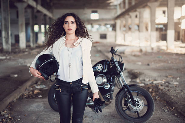 tough chica - motorcycle women helmet sensuality fotografías e imágenes de stock