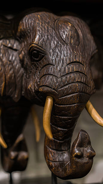 istock Wooden elephant figurine 604374108