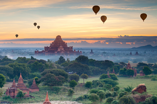 Beautiful sunset scene of Ancient Pagoda in Bagan , Myanmar