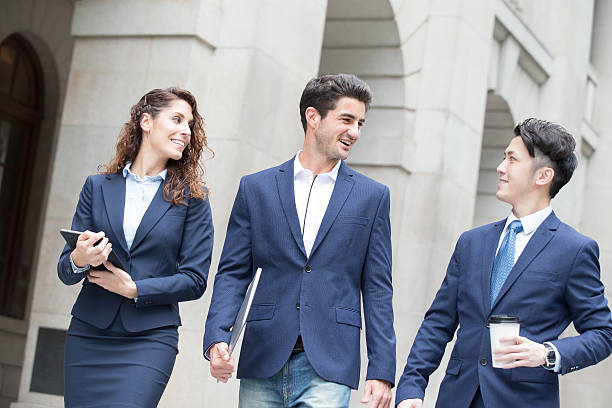 istock business people walk on road 604377384