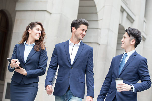istock business people walk on road 604377438