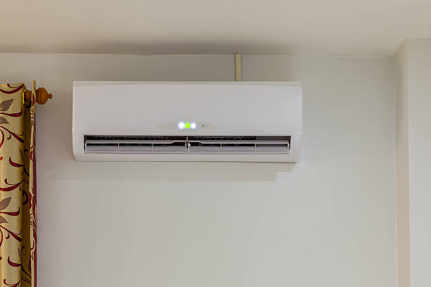 istock air conditioner install on wall for condo or meeting room 604377760