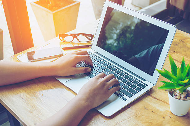 istock woman use laptop  to working in office. 604379514