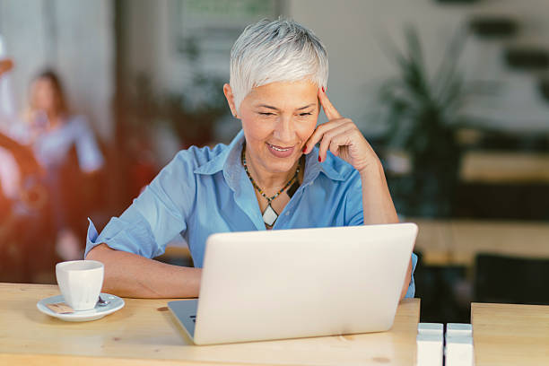 istock Mature Woman Working Out Of Office 604380378