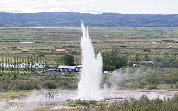 istock Impressive eruption of the biggest active geysir, Strokkur, with 604383622
